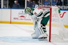 Wild goaltender Kaapo Kahkonen pauses after giving up a short-handed goal to St. Louis Blues' Ryan O'Reilly during the second period