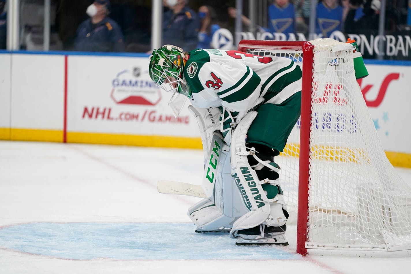 Wild goaltender Kaapo Kahkonen pauses after giving up a short-handed goal to St. Louis Blues' Ryan O'Reilly during the second period