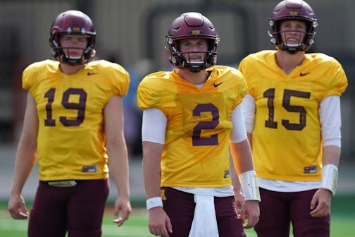 Minnesota Golden Gophers quarterback Tanner Morgan (2) worked out with his fellow quarterbacks during practice Friday.