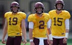 Minnesota Golden Gophers quarterback Tanner Morgan (2) worked out with his fellow quarterbacks during practice Friday.