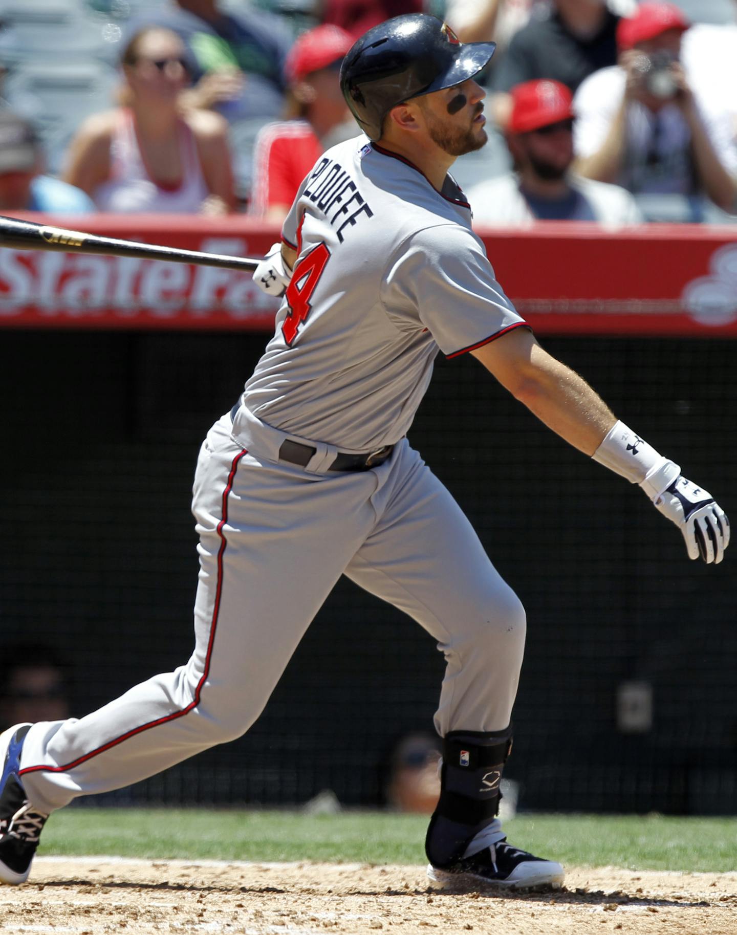 Minnesota Twins&#x2019; Trevor Plouffe hits a three-run home run against the Los Angeles Angels to also score Joe Mauer and Miguel Sano during the fourth inning of a baseball game in Anaheim, Calif., Thursday, July 23, 2015. (AP Photo/Alex Gallardo)