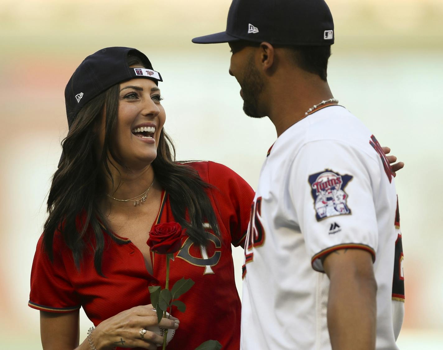 Minnesota Twins left fielder Eddie Rosario surprised The Bachelorette, Becca Kufrin, with a rose after he caught her ceremonial first pitch before the game against the Royals. Kufrin is from Prior Lake.