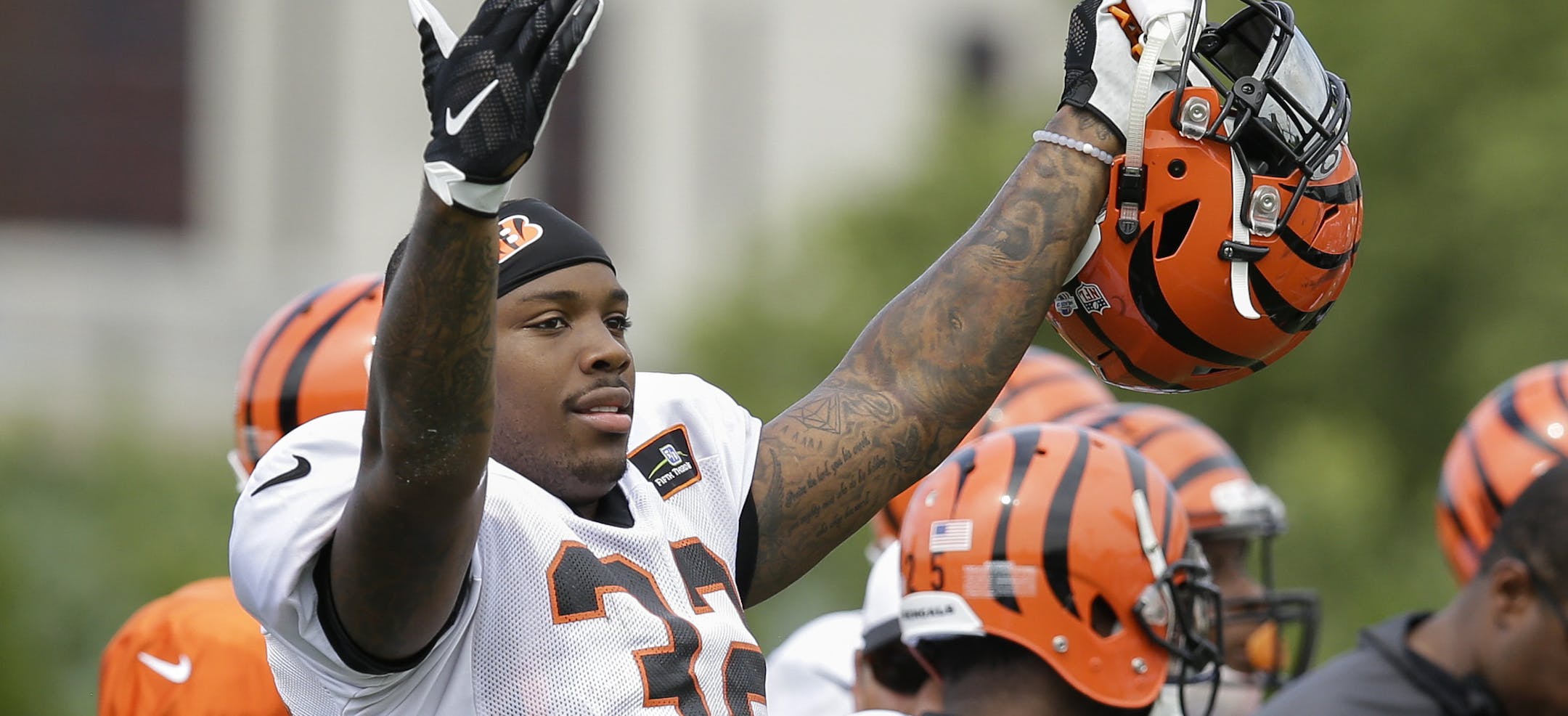 Cincinnati Bengals half back Jeremy Hill participates in NFL football training camp, Tuesday, Aug. 4, 2015, in Cincinnati. (AP Photo/John Minchillo)