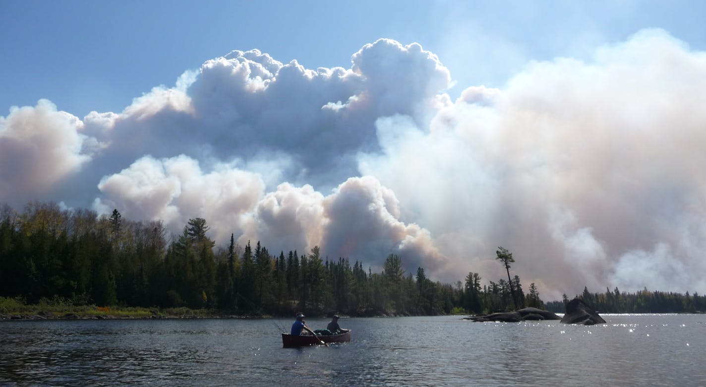 Smoke rose from the south between Lake Four and Three.