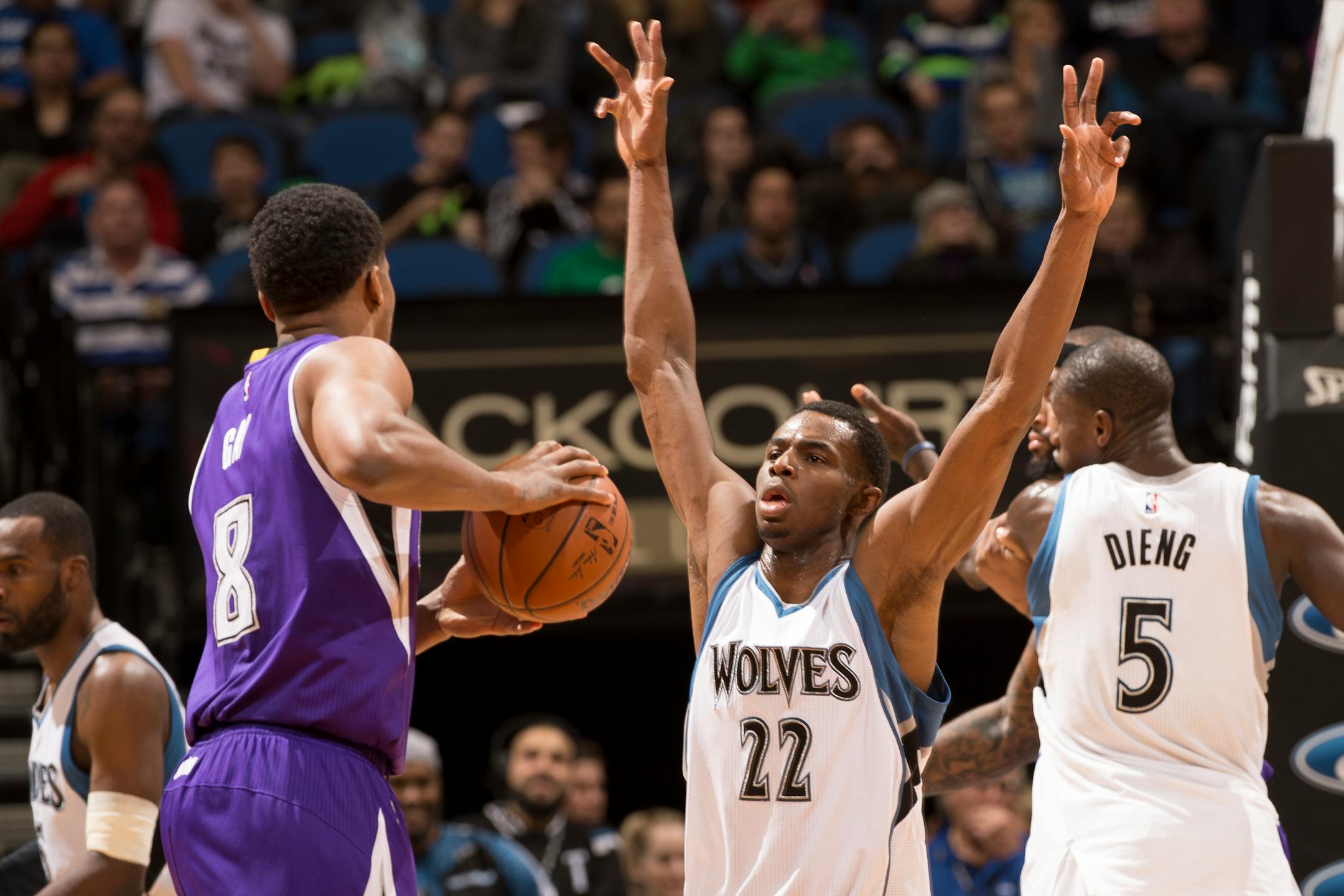 Minnesota Timberwolves forward Andrew Wiggins (22) defends against Sacramento Kings forward Rudy Gay (8) during the second quarter.