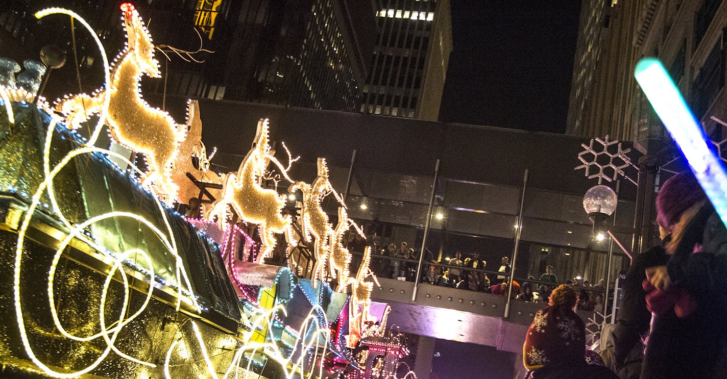 Santa's sleigh closes first night of the 2013 Target Holidazzle parade on Nicollet Mall in Minneapolis November 29, 2013. (Courtney Perry/Special to the Star Tribune) ORG XMIT: MIN1311292056161772 ORG XMIT: MIN1312191408401922