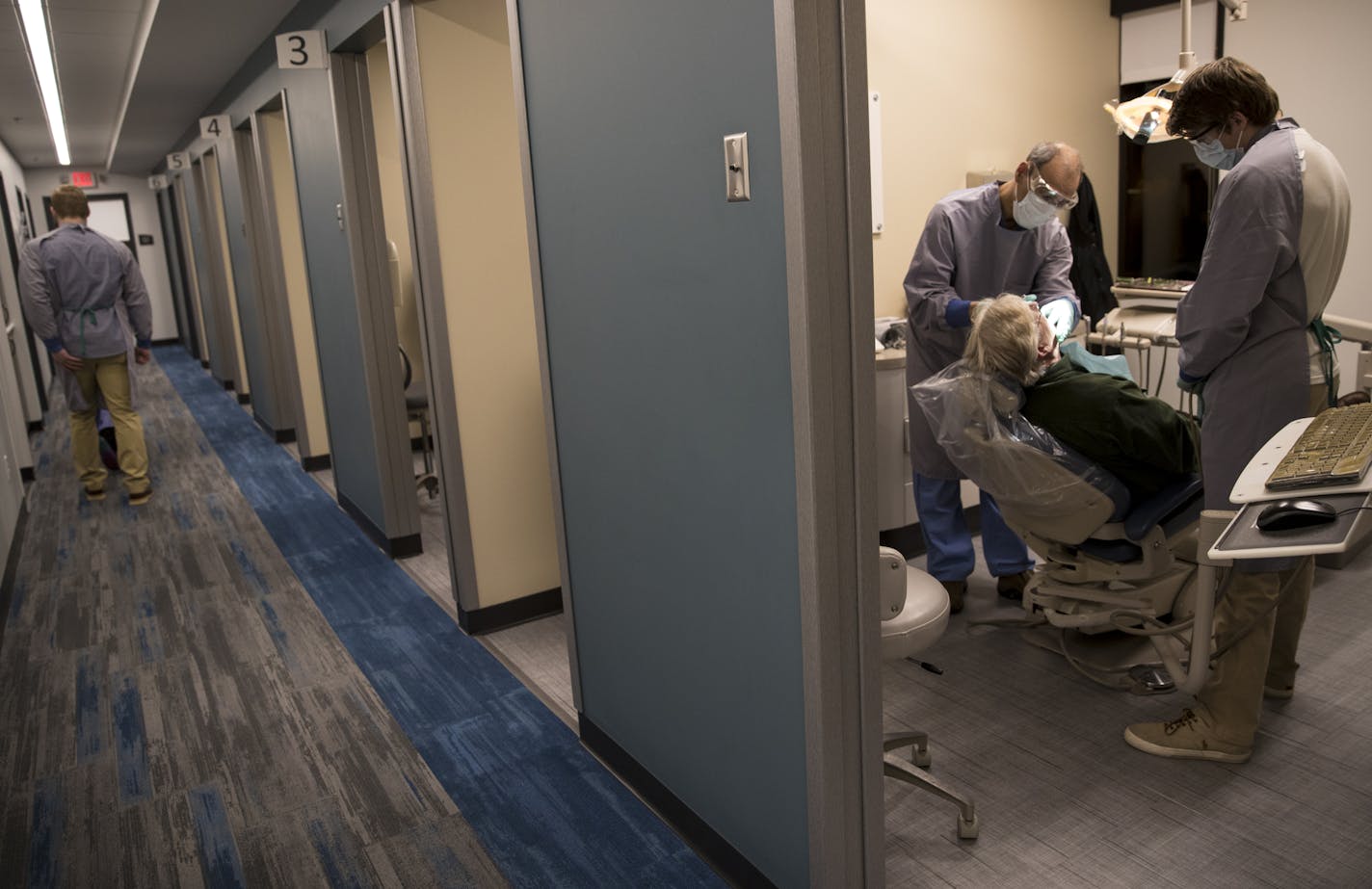 Dr. Patrick McGann and dental student Brady Hartman did a tooth extraction on Clayton Ristrom at Hope Dental Clinic on Thursday, February 8, 2018, in St. Paul, Minn. Hope Dental Clinic, a free dental clinic, started in early 2017 as an offshoot of a free operation provided to the clients of Union Gospel Mission in St. Paul since 1965. Dozens of volunteer dentists work out of the clinic in the Dayton's Bluff neighborhood on the East Side of St. Paul, serving families and children too poor to pay