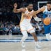 Timberwolves center Karl-Anthony Towns drives on Hawks forward Bruno Fernando on Friday, Towns' first game back from a lengthy injury hiatus. He figur