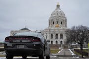 A Capitol Security officer kept an eye on the State Capitol Wednesday, Jan. 3, 2024 St. Paul, Minn. Buildings were evacuated and security tightened du