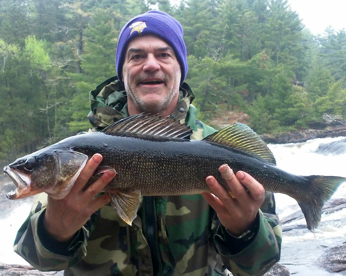 Bart Grams of Blaine with a 29 1/4-inch walleye he caught this spring in the BWCA.