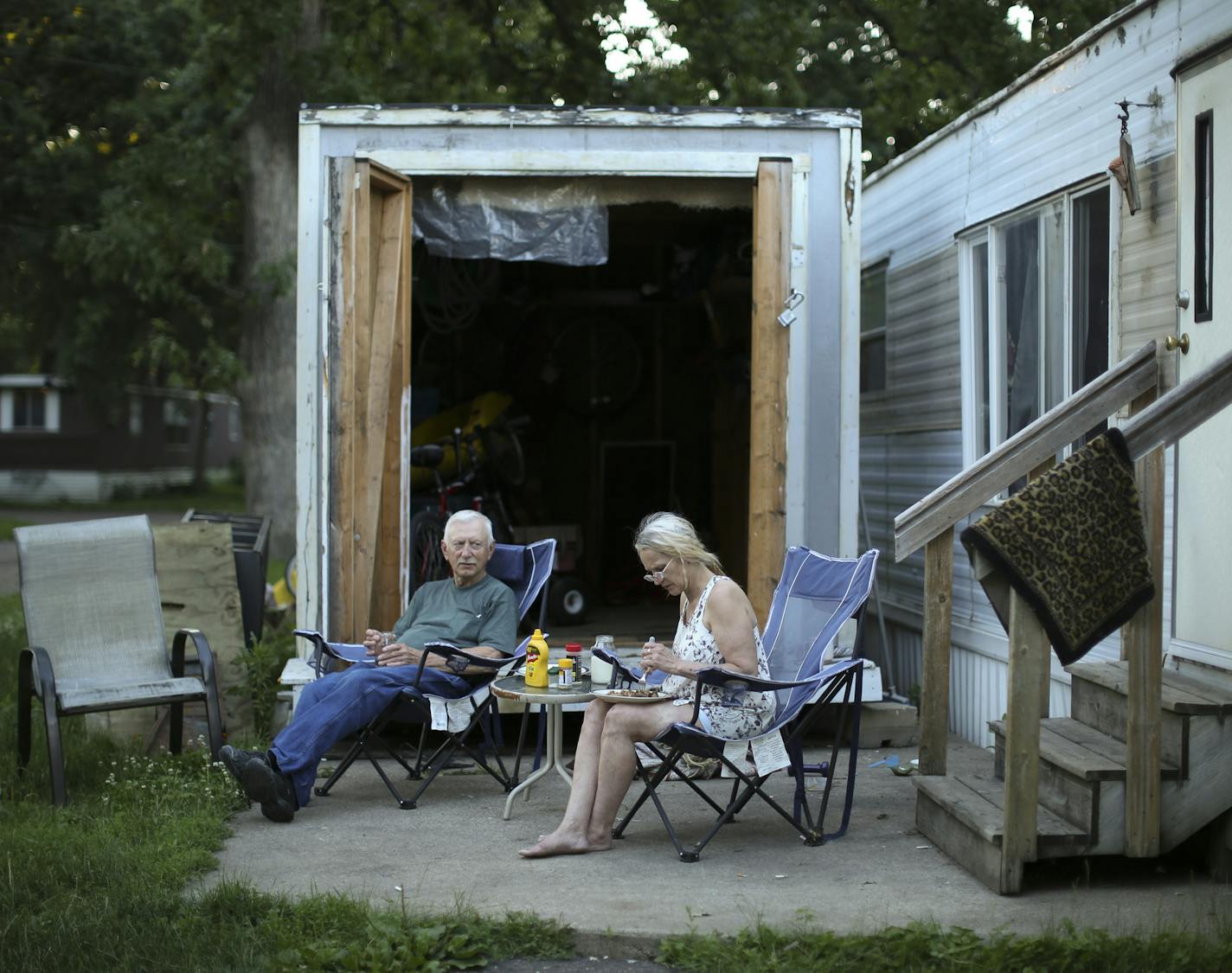 Lisa Bieker ate dinner on her patio with her dad, Joe Bieker. She's lived in a 1962 mobile home at Lowry Grove for five years. She received a diagnosis of terminal cancer earlier this year and doesn't know where she would move if she had to. ] JEFF WHEELER &#xef; jeff.wheeler@startribune.com Manufactured homes are often the only affordable housing in many suburbs. They also provide the only glimmer of ethnic and racial diversity, but their numbers are declining in the Twin Cities. Preserving the