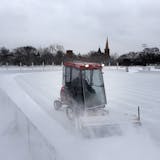 Jeff VanGuilder of the Minneapolis Park board cleared snow from an outdoor ice rink at Logan Park in Northeast Minneapolis on Tuesday.