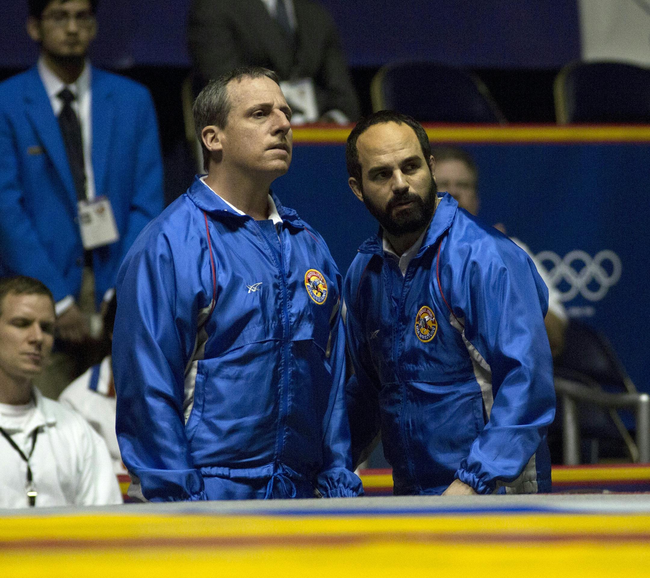 This image released by Sony Pictures Classics shows Steve Carell, left, and Mark Ruffalo in a scene from "Foxcatcher." (AP Photo/Sony Pictures Classics, Scott Garfield)