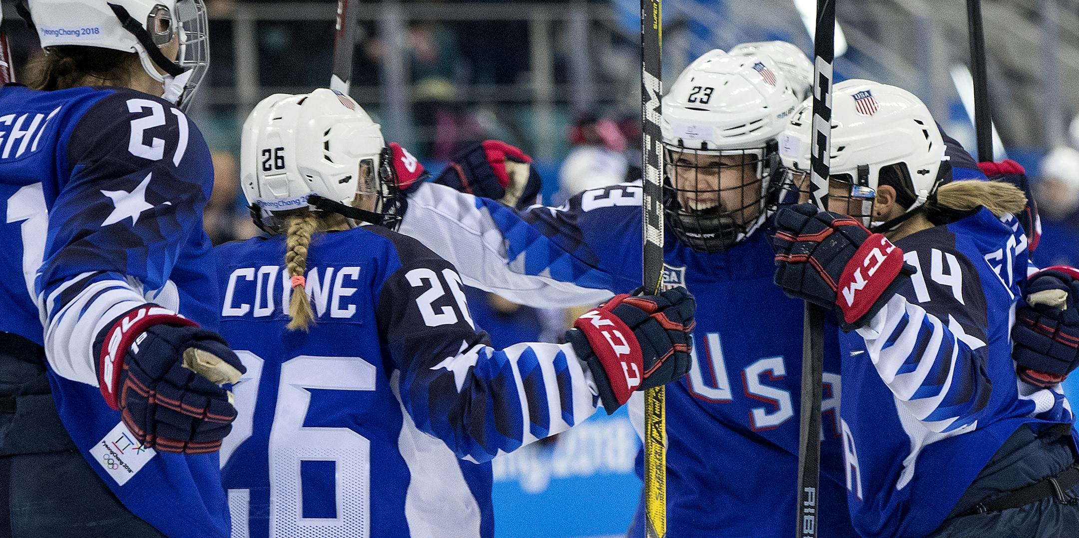 Hilary Knight (21) celebrated with teammates after scoring a power play goal in the first period.
