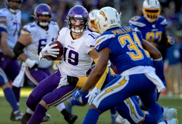 Adam Thielen worked for extra yardage vs. the Chargers in 2019.