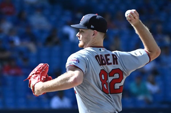 Minnesota Twins' Bailey Ober pitches in the first inning of a baseball game against the Toronto Blue Jays in Toronto on Saturday, Sept. 18, 2021. (Jon
