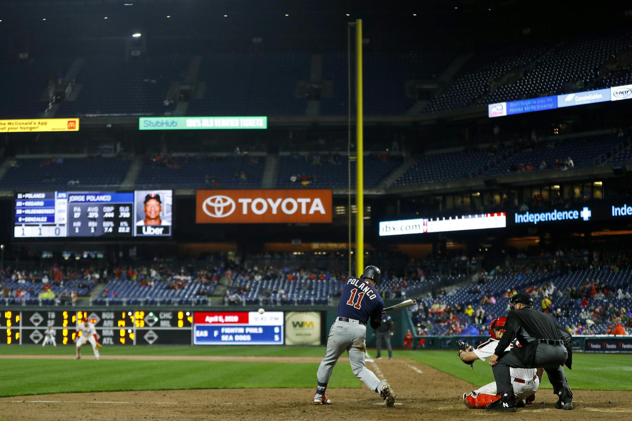 Minnesota Twins' Jorge Polanco hits a double off Philadelphia Phillies relief pitcher Adam Morgan during the sixth inning of a baseball game Friday, April 5, 2019, in Philadelphia. Philadelphia won 10-4. (AP Photo/Matt Slocum)