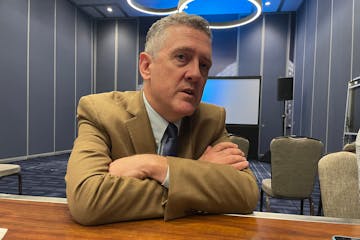 James Bullard, president of the Federal Reserve Bank of St. Louis, spoke to reporters after an appearance at the Economic Club of Minnesota on Friday.