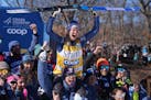 Minnesota native Jessie Diggins celebrated her third-place finish at the women's 10-kilometer race Sunday at Theodore Wirth Park.