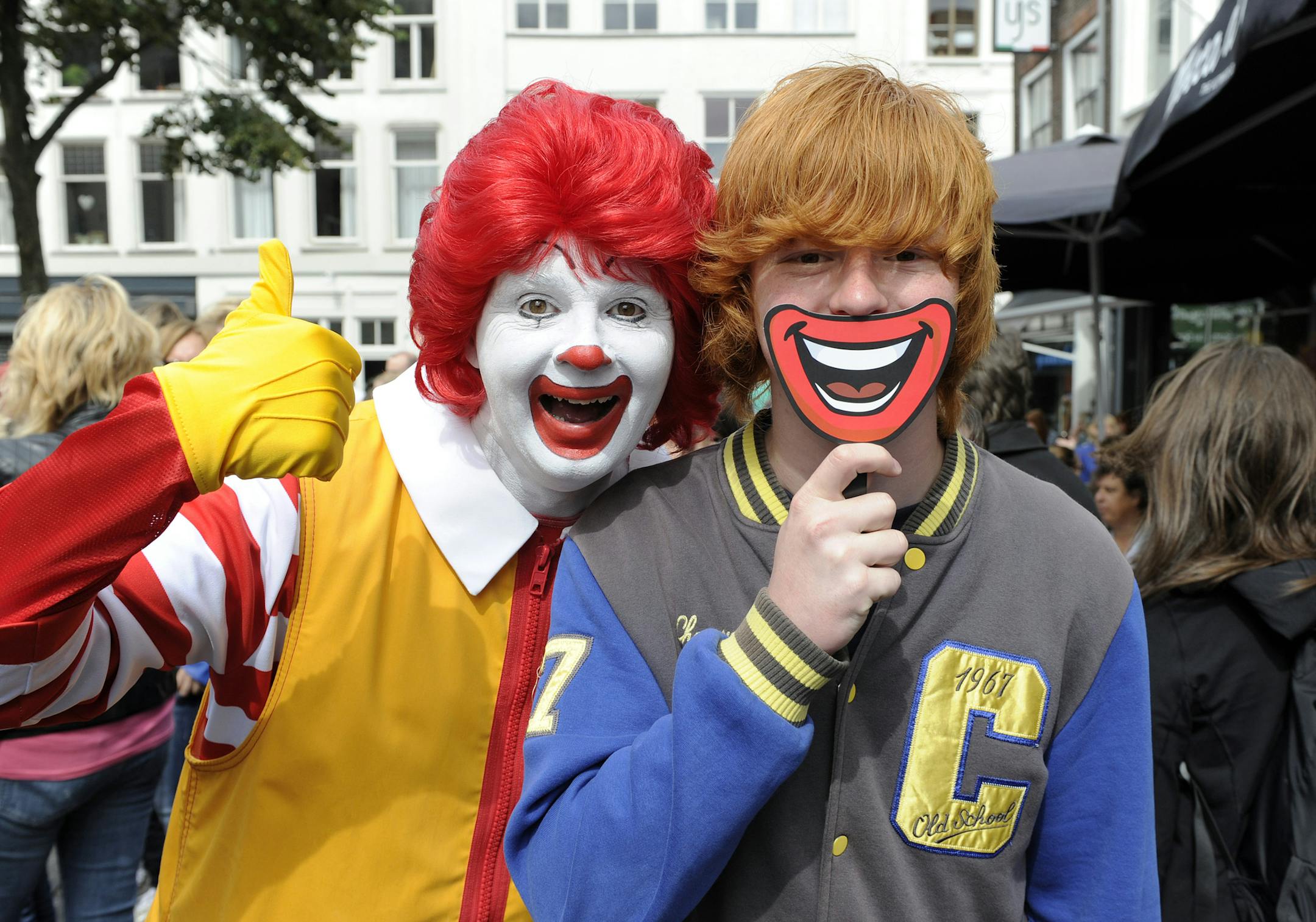 Caption for STRIB: Olson&#x201a;&#xc4;&#xf4;s first piece of business with McDonald&#x201a;&#xc4;&#xf4;s came earlier this year when it handled a McDonald&#x201a;&#xc4;&#xf4;s sponsored event in the Netherlands to break a Guinness world record with the largest gathering of red-headed people in one place, with red-haired Ronald McDonald in in attendance, according to a trade journal. credit: (Patrick Post/AP Images for McDonald's) IMAGE DISTRIBUTED FOR MCDONALD'S - McDonald's and Guinness World R