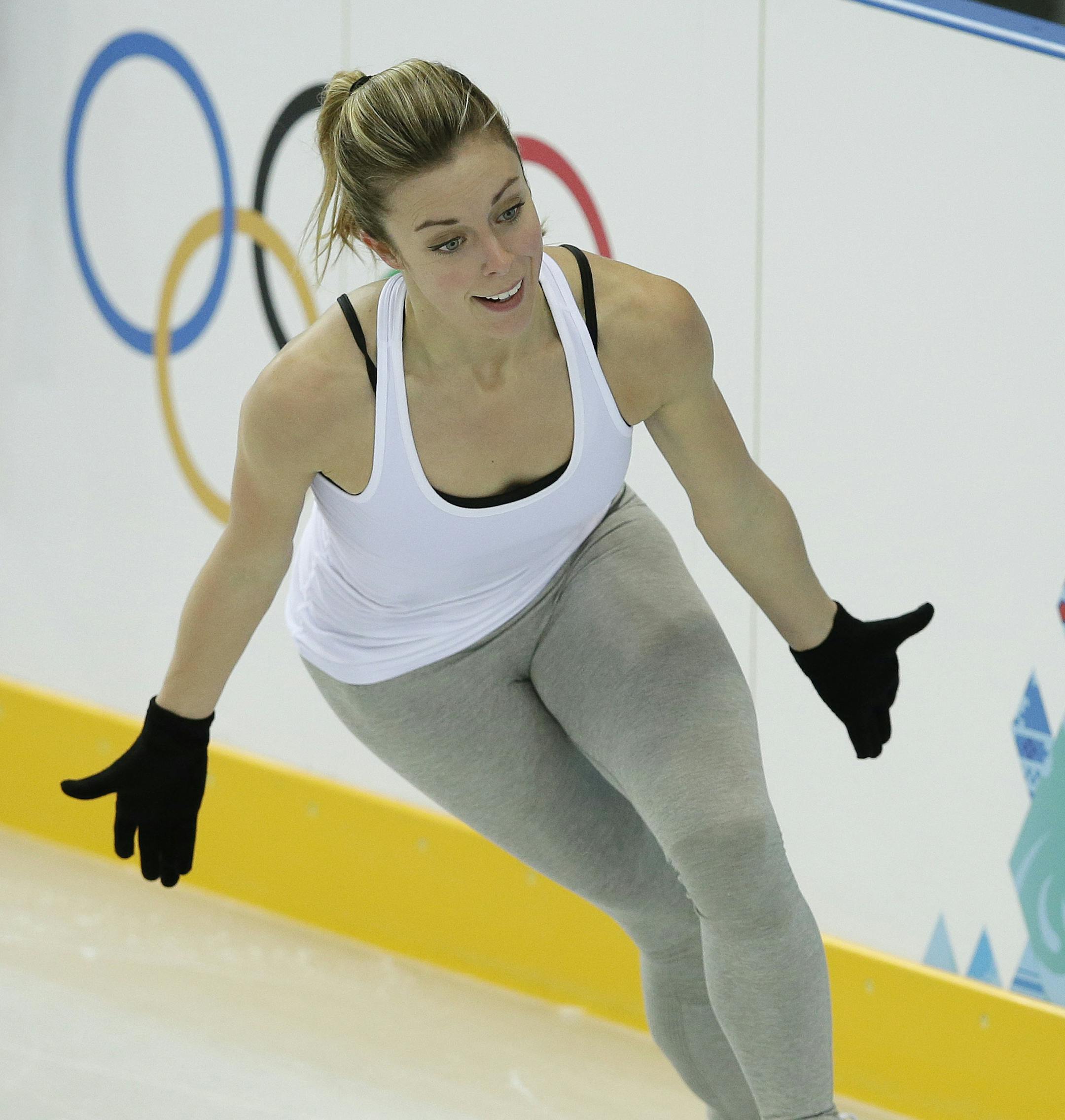 Ashley Wagner of the United States skates during a practice session at the figure stating practice rink at the 2014 Winter Olympics, Monday, Feb. 17, 2014, in Sochi, Russia. (AP Photo/Darron Cummings)