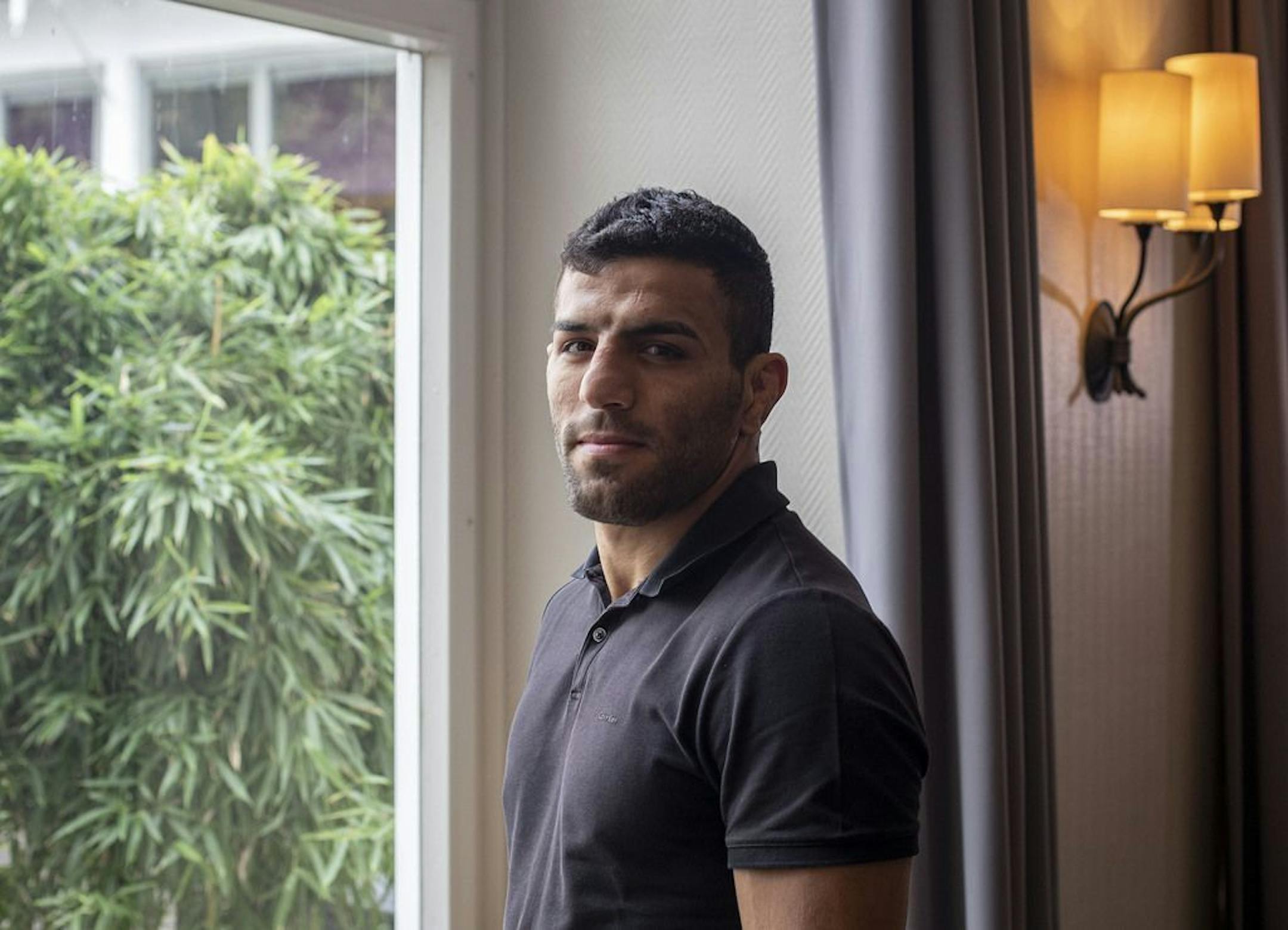In this photo taken Sept. 12, 2019, Iranian judoka Saeid Mollaei poses for a portrait photo at an undisclosed southern city of Germany. Saeid Mollaei has been in hiding since he left the Iranian judo team last month, saying he had been ordered to withdraw from the world championships on political grounds.
