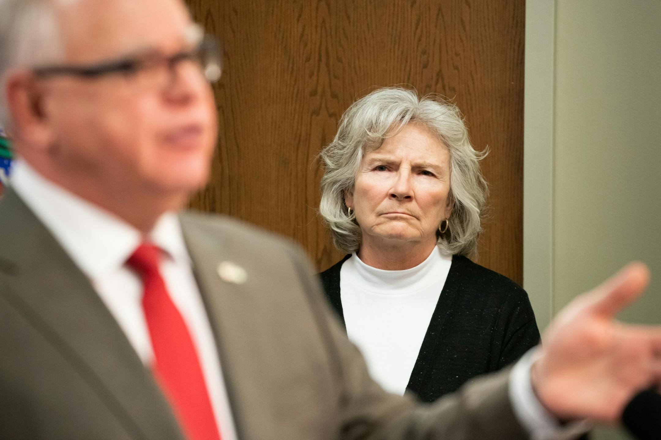Health Commissioner Jan Malcolm listened as Governor Walz spoke at the press conference. In a tightly pooled press conference, Minn. Governor Walz provided an update on the state's next steps to respond to COVID-19. He was joined by Health Commissioner Jan Malcolm, Employment and Economic Development Commissioner Steve Grove, and Homeland Security and Emergency Management Director Joe Kelly and other state officials.