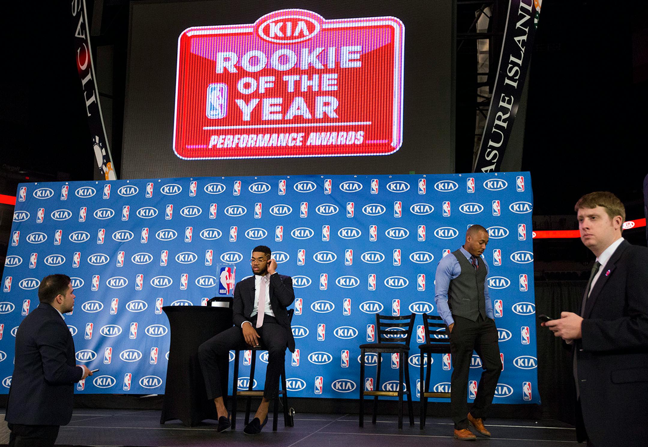 Whith his vintage glasses and sockless style, Karl-Anthony Towns waits for an interview with ESPN after the announcement of his NBA Rookie of the Year Award.