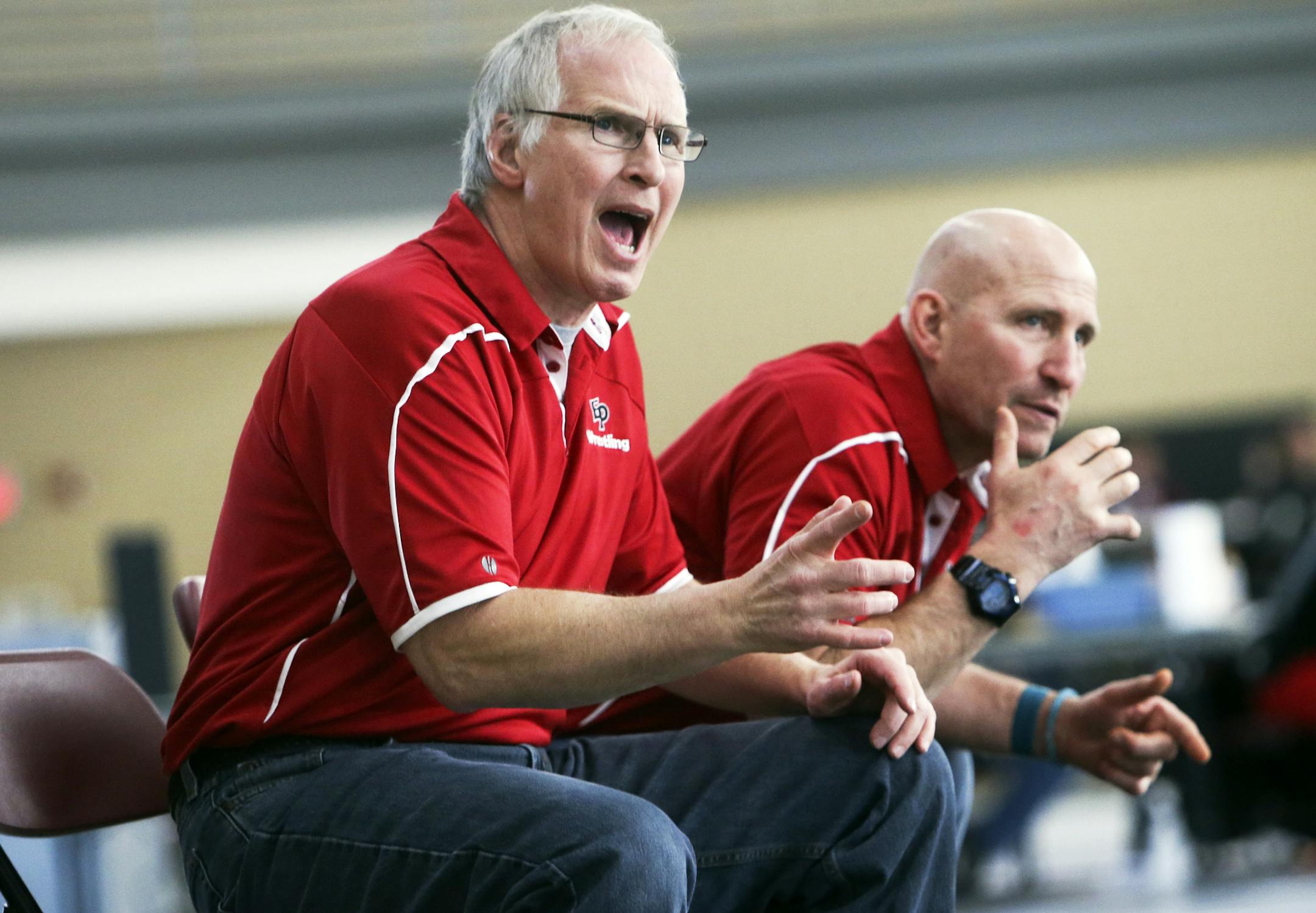 Eden Prairie head wrestling coach Scot Davis, left, and assistant coach Jeff Hohertz have high expectations and enthusiasm for the Eagles' program.
