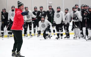 Minneapolis hockey coach Joe Dziedzic worked with his players during practice Wednesday afternoon. ] ANTHONY SOUFFLE • anthony.souffle@startribune.c