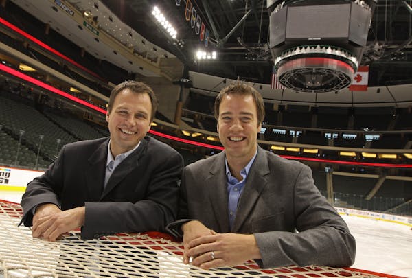 Wild assistant coach Darby Hendrickson (right, with director of player development Brad Bombardir) in 2010.
