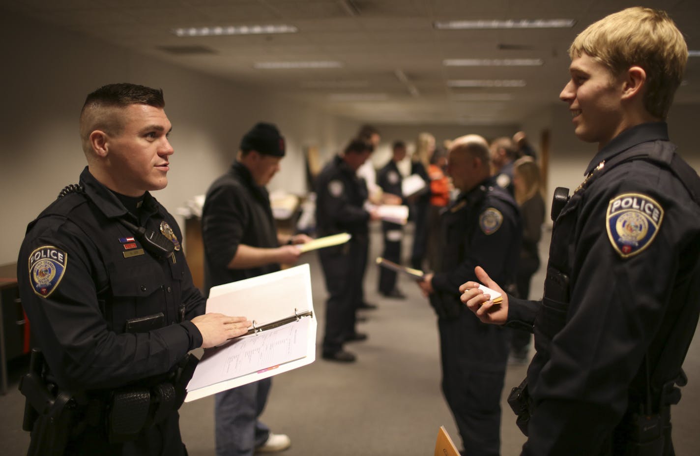 Officers Nicholas Gisi, left, and Sam Scheeler practiced new Spanish phrases on each other at class Wednesday night at a Metro Transit's office in St. Paul. ] JEFF WHEELER &#x201a;&#xc4;&#xa2; jeff.wheeler@startribune.com Metro Transit police officers are encountering more and more Spanish speakers as they make their rounds and respond to calls. The problem is few officers speak the language. Now some are taking Spanish lessons to help them better serve those they interact with. Normandale Commu