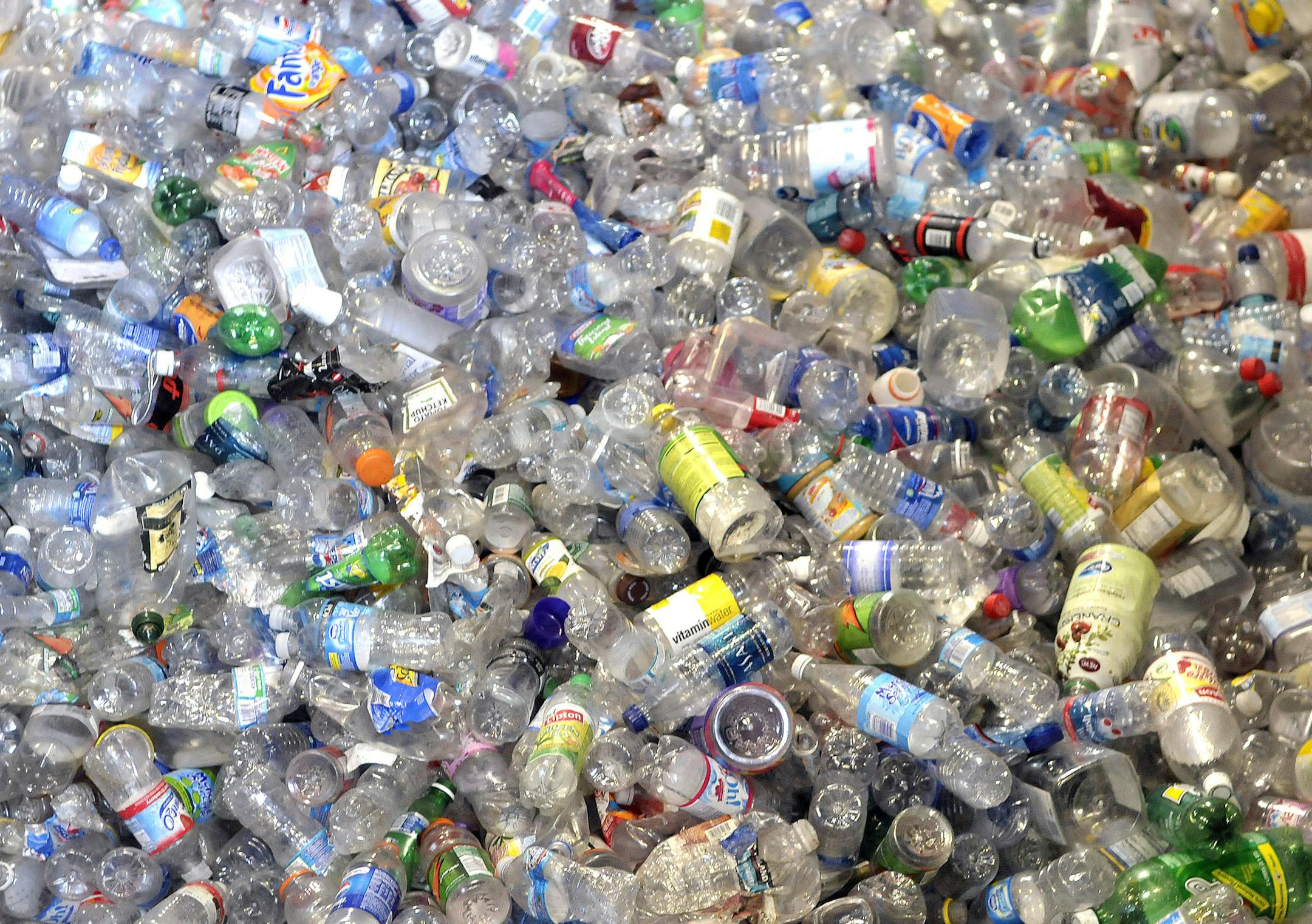 GLEN STUBBE &#xef; gstubbe@startribune.com -- Tuesday, July 29, 2008 -- Delano, Minn. -- ] Separated clear plastic bottles at Randy's Sanitation and Recycling of Delano.