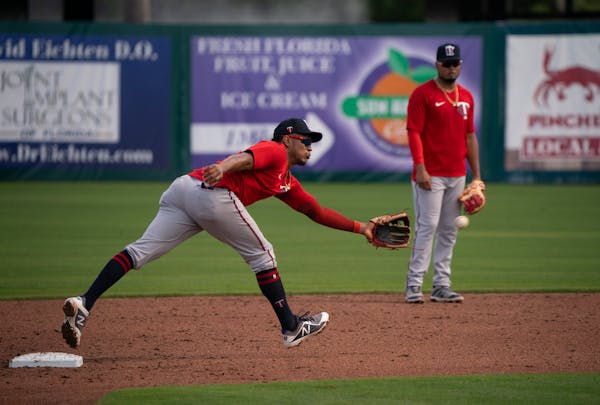 Twins infielder Jorge Polanco fielded a grounder during a drill on Saturday.