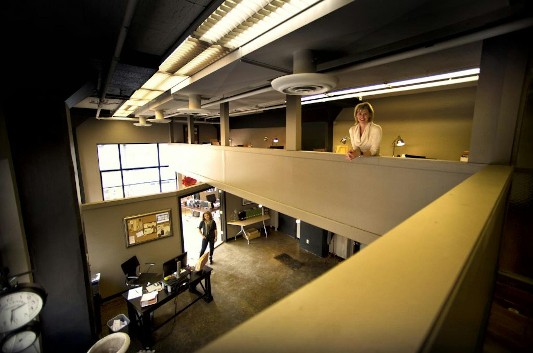 Karen Althen runs Station K Marketing in the Brin building in the North Loop. Below her was team assistant Alex Waters.