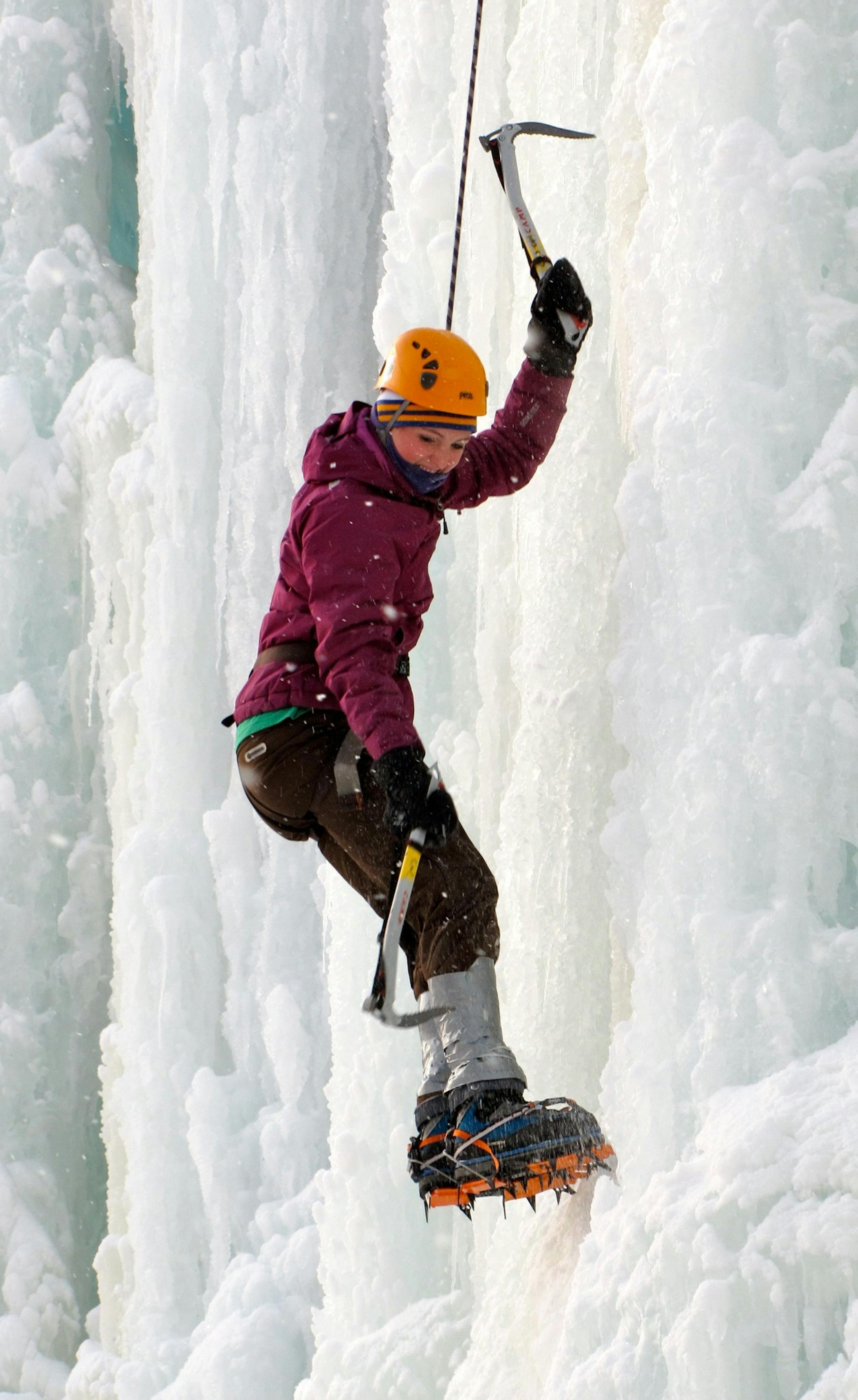 Photo by Lisa Meyers McClintick. First-time and experienced ice climbers can be found scaling the icy walls of Sandstoneís Robinsonís Quarry on weekends throughout the winter.