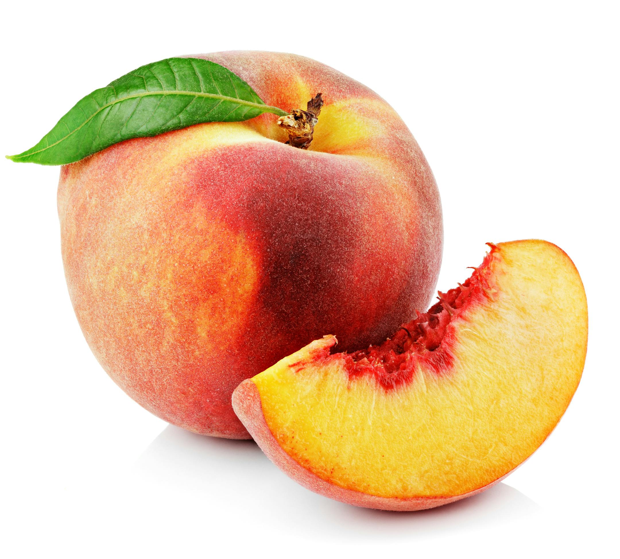 Peach with slice and leaf isolated on white background