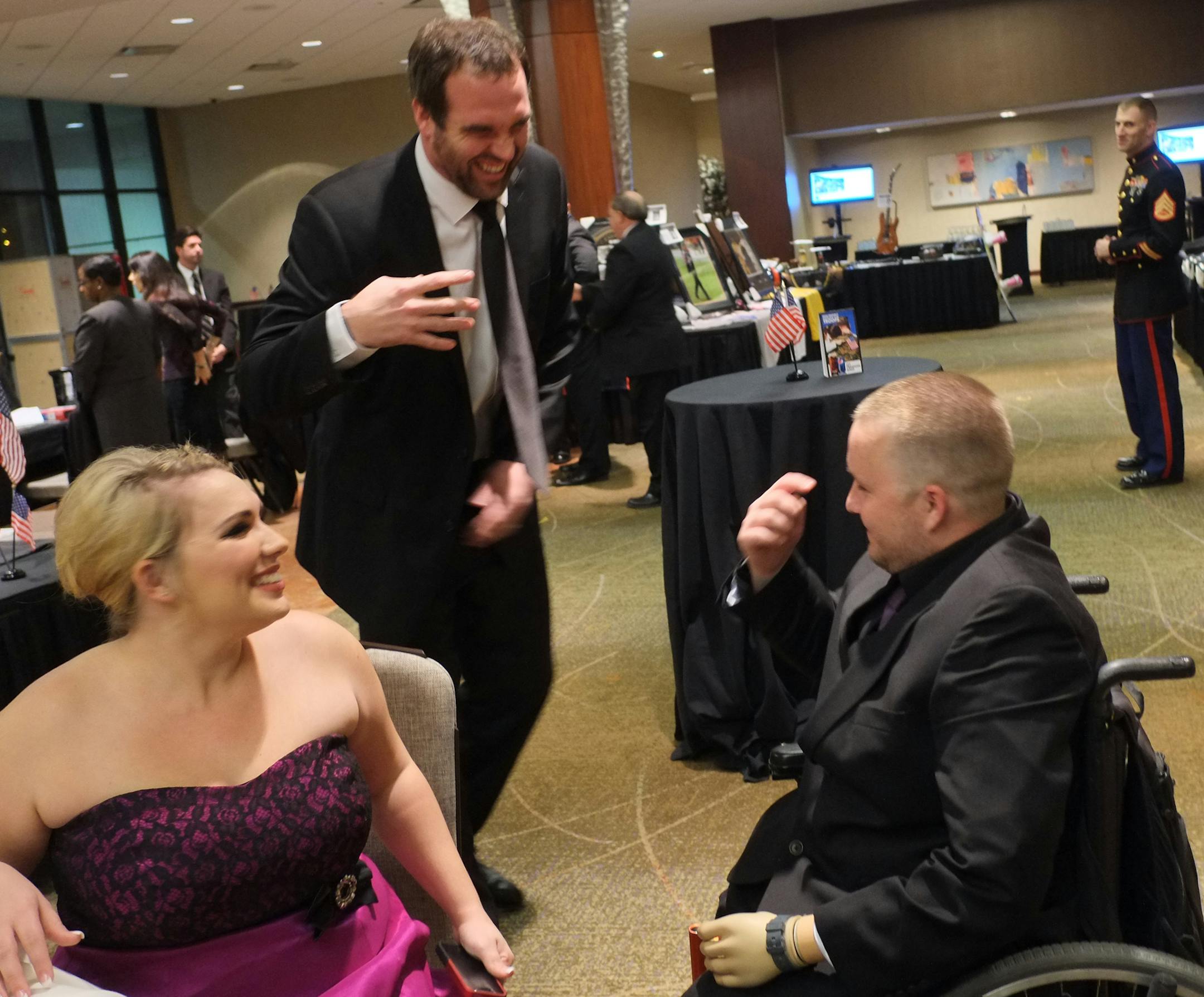 Jared Allen greets Joshua Bullis and his girl friend, Tory Walker at his gala in Minneapolis. Minnesota Vikings star Jared Allen charity, Homes for Wounded Warriors, helps remodel homes for wounded servicemen and women. For example; Joshua Bullis, who lost both legs in Afghanistan, and girlfriend Tory Walker, who attended Allen's charity gala in Minnesota last november, was given $50,000 in upgrade to their Arizona home. A silent auction was held the night of the gala some of the items were, [ S