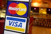 Image of VISA and MasterCard sign