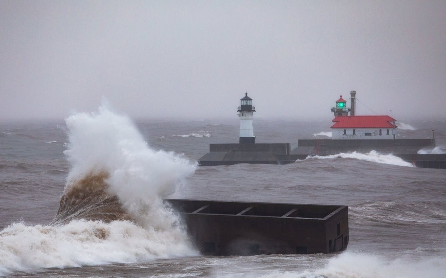 Waves crash against Uncle Harvey's Mausoleum Sunday, December 29, 2019 near Canal Park in Duluth, Minn. A large multi-day winter storm featuring snow, rain, sleet and high winds impacted northern Minnesota.