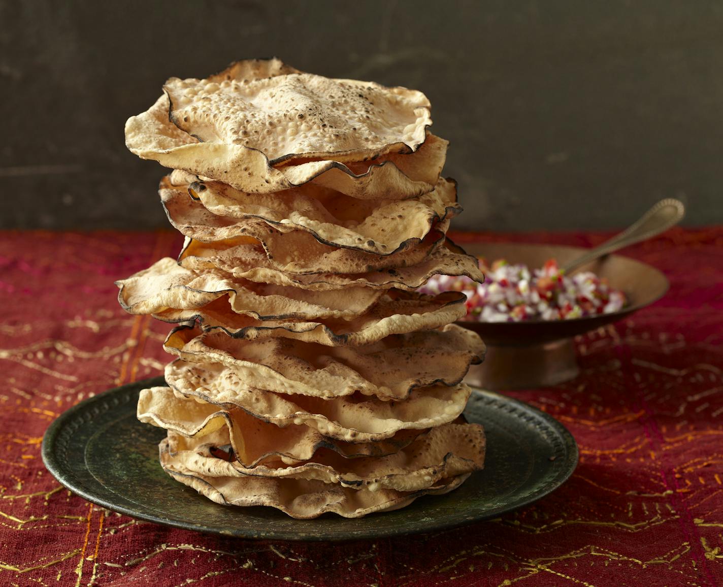 Credit: Courtesy of Workman Publishing Co., Inc. Food photography by Lucy Schaeffer Poppadums, from Raghavan Iyer's new cookbook, "Indian Cooking Unfolded."