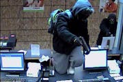 An image from a security camera of two men who robbed the Guaranty Bank in Coon Rapids on Friday, November 14, 2014.