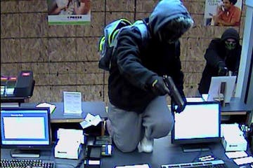 An image from a security camera of two men who robbed the Guaranty Bank in Coon Rapids on Friday, November 14, 2014.