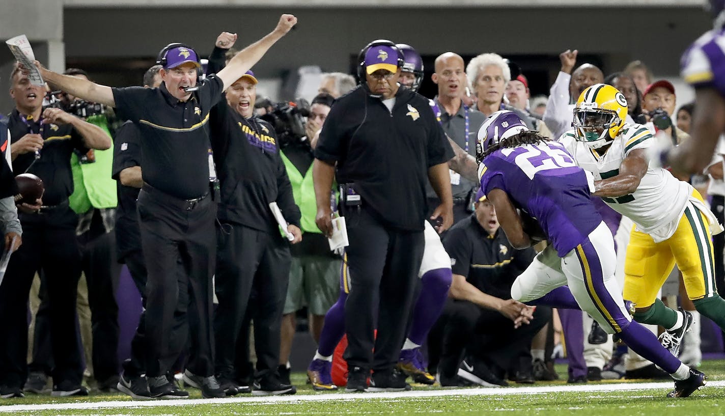 Vikings head coach Mike Zimmer reacted after Trae Waynes (26) intercepted a pass off of Green Bay Packers quarterback Aaron Rodgers in the fourth quarter.