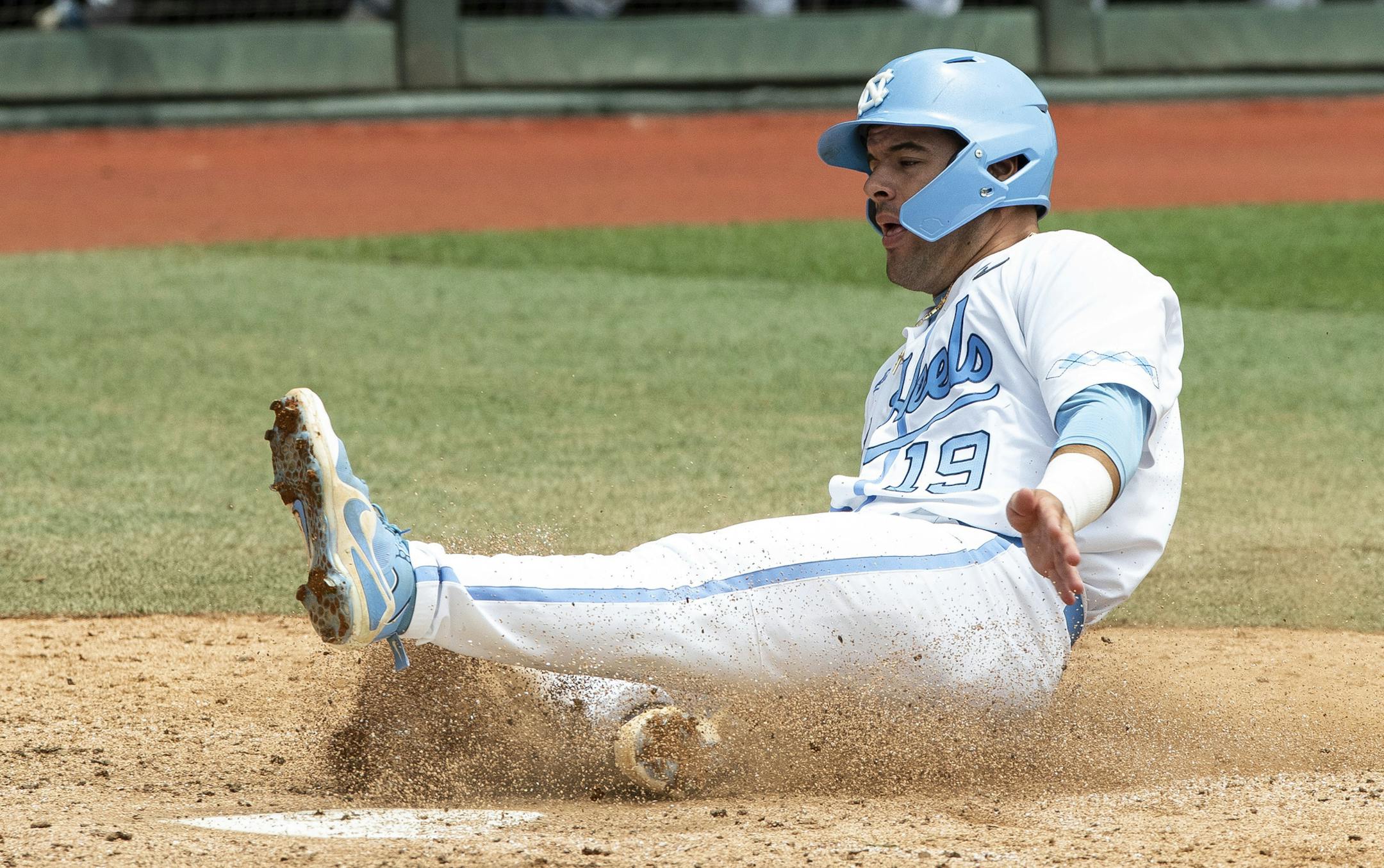 FILE - In this June 8, 2019, file photo, North Carolina's Aaron Sabato scores a run against Auburn during Game 1 at the NCAA college baseball super regional in Chapel Hill, N.C. The Minnesota Twins selected Sabato during the first round of the baseball draft Wednesday, June 10, 2020. (AP Photo/Ben McKeown, File)