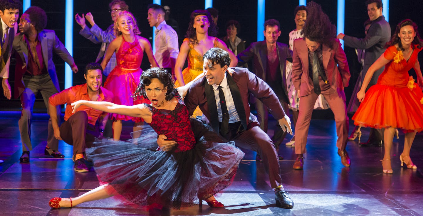 Ana Isabelle (Anita), Marco Antonio Santiago (Bernardo) and the cast of the Guthrie Theater&#xed;s production of "West Side Story."
Photo by T. Charles Erickson