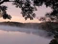 Mist rises from Elbow Lake in Ottertail County. Lisa Meyers McClintick
