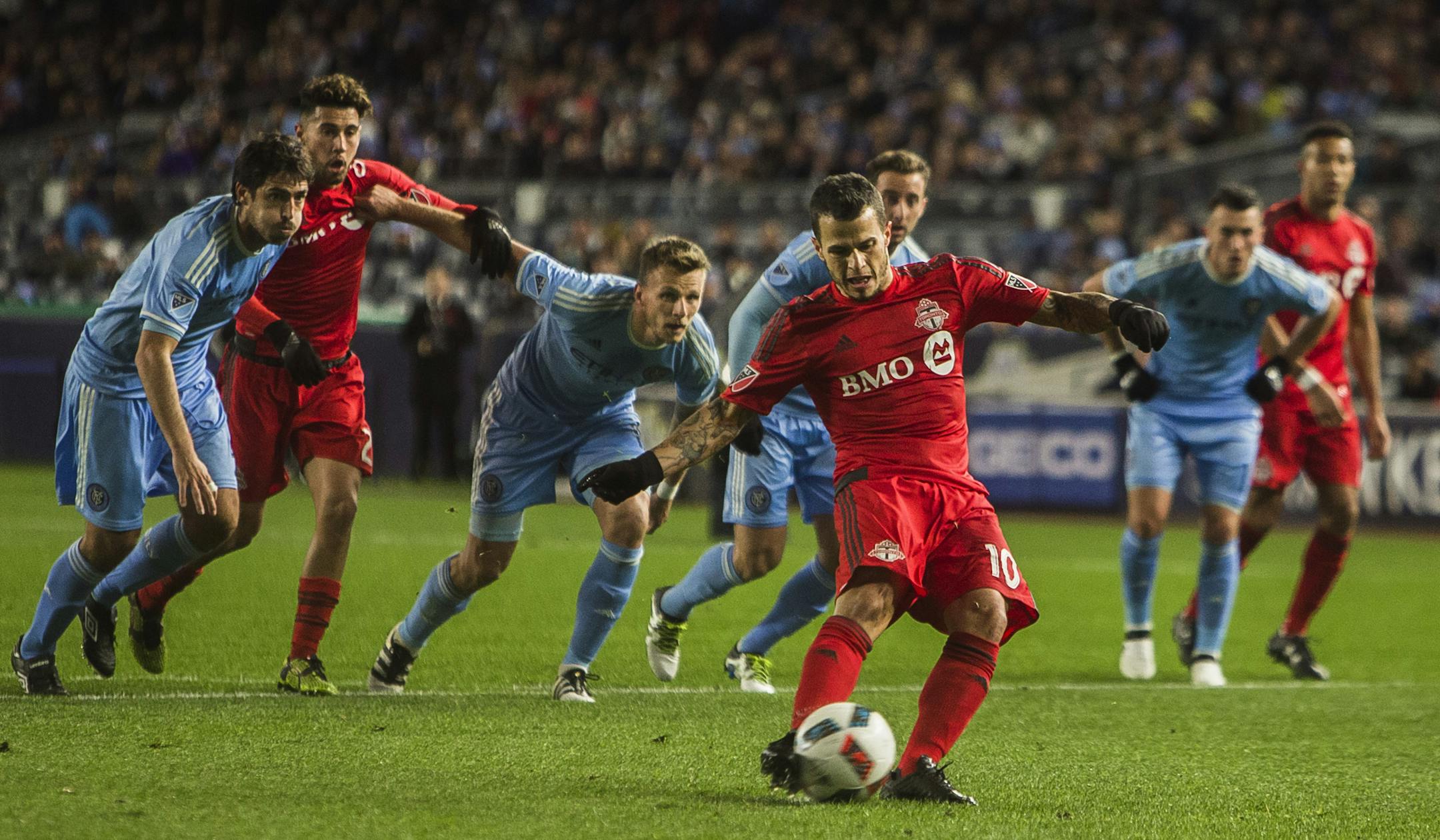 Toronto FC Sebastian Giovinco (10) scores his goal during a MLS second leg eastern semifinals soccer match against New York City FC at Yankee stadium, in New York, Sunday, Nov. 6, 2016. (AP Photo/Andres Kudacki)