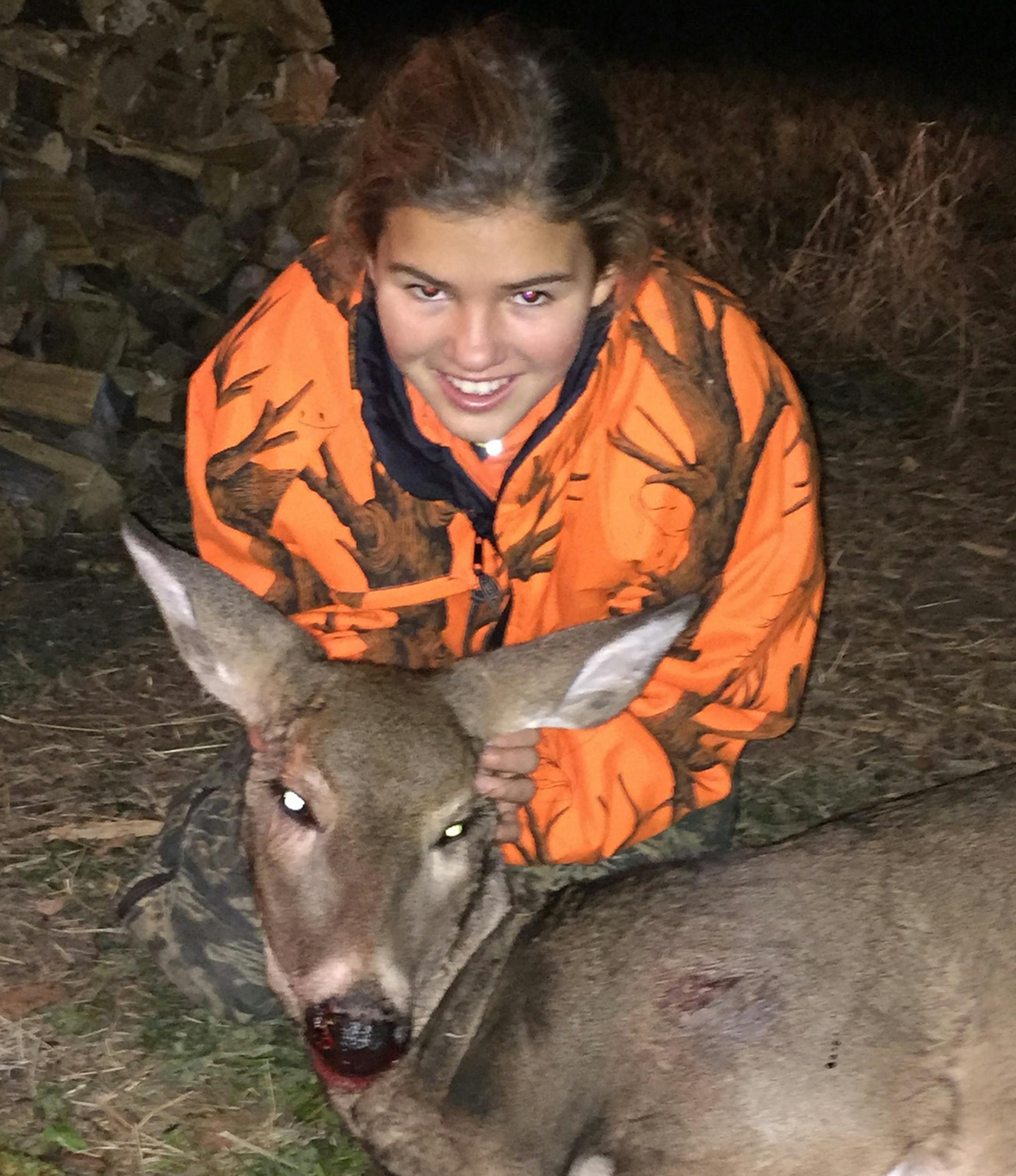 Lydia Larson, 11, hunted with her dad, Kyle, over MEA weekend, felling this doe - her second in as many seasons. Two other girls and their dads also hunted with the Larsons in northern Minnesota near Baudette.