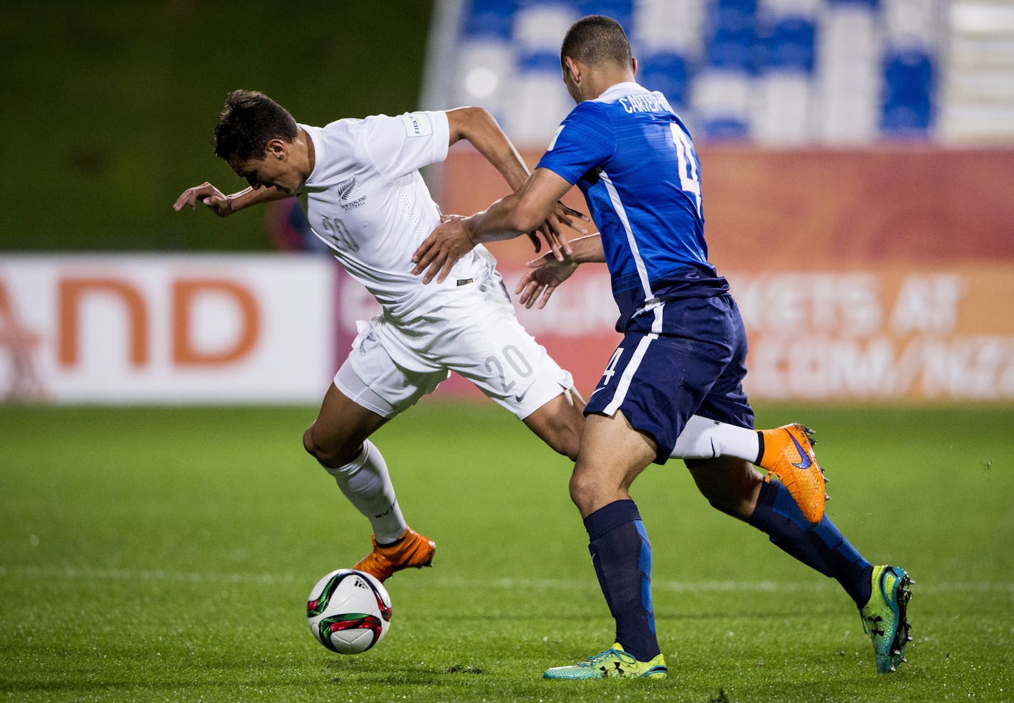 New Zealand's Noah Billingsley, left, and Cameron Carter-Vickers of the US compete for the ball during their U20 soccer World Cup match in Auckland, New Zealand, Tuesday, June 2, 2015. (Dean Purcell /New Zealand Herald, via AP) NEW ZEALAND OUT, AUSTRALIA OUT ORG XMIT: NZH802